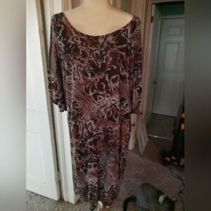 DOTS poly/spandex knit dress with cut-out sleeves.  Animal print/gold accents